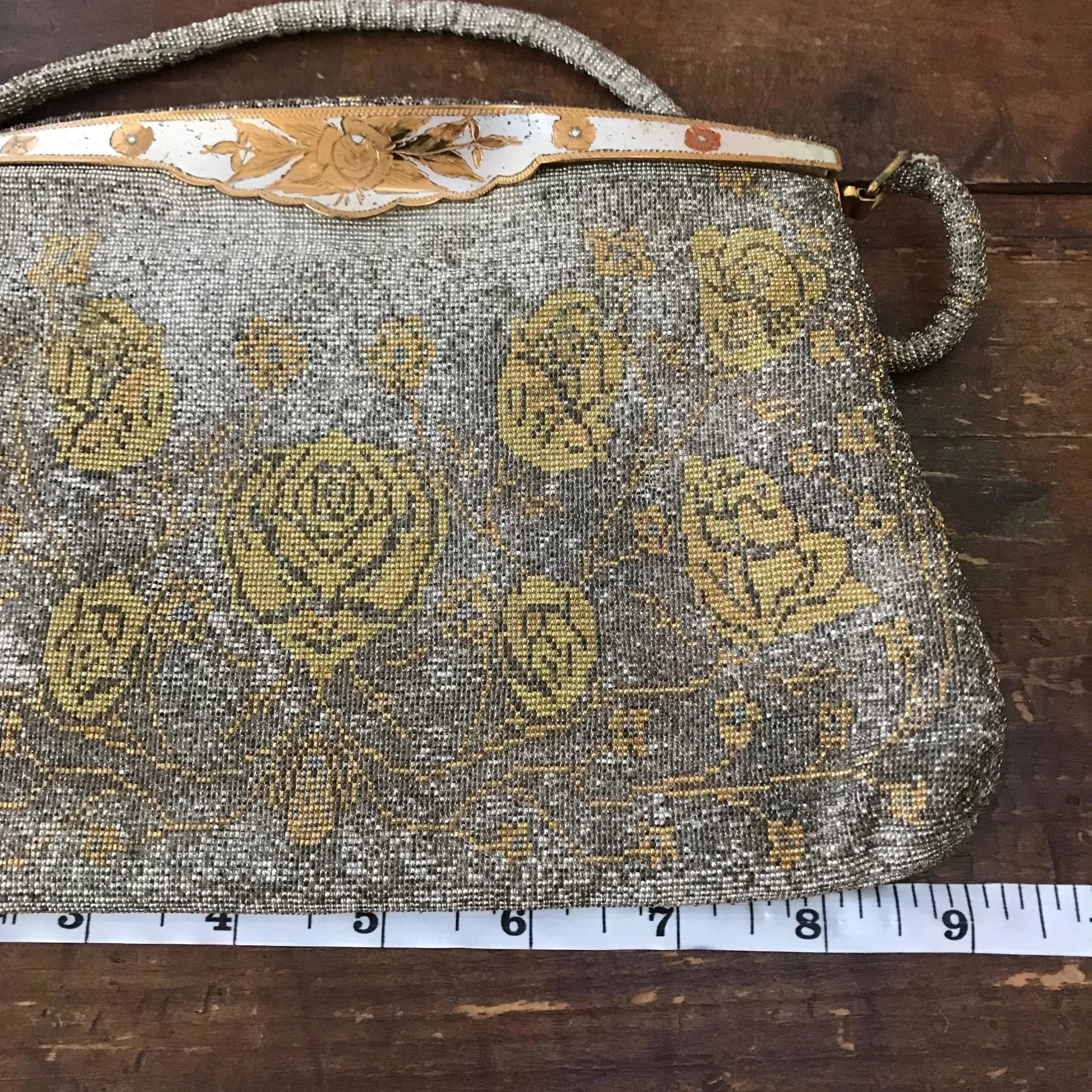 Vintage Metal Mesh Metallic Clutch in Silver and Gold with a Floral design by Saks Fifth Avenue.