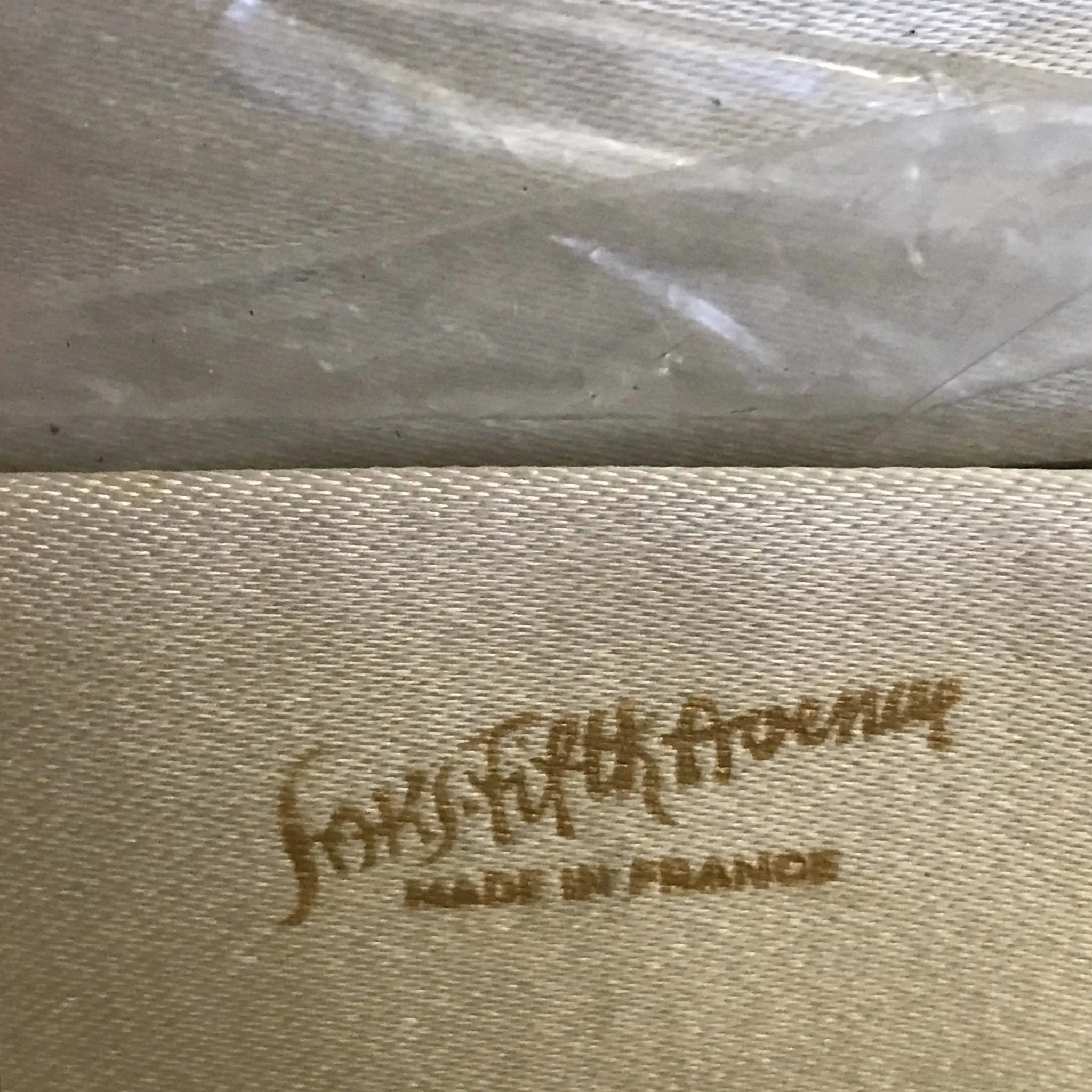 Vintage Metal Mesh Metallic Clutch in Silver and Gold with a Floral design by Saks Fifth Avenue.